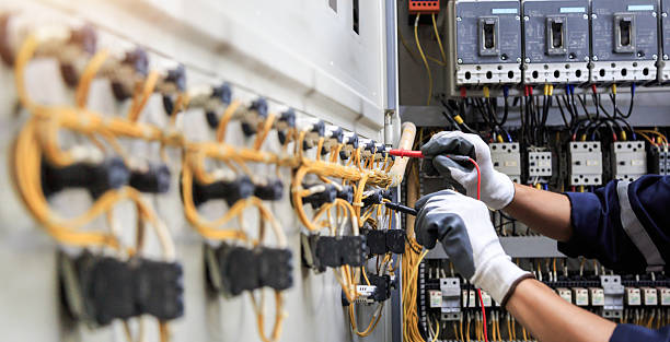 Professional Electrician technician working in Lake Land'Or, VA